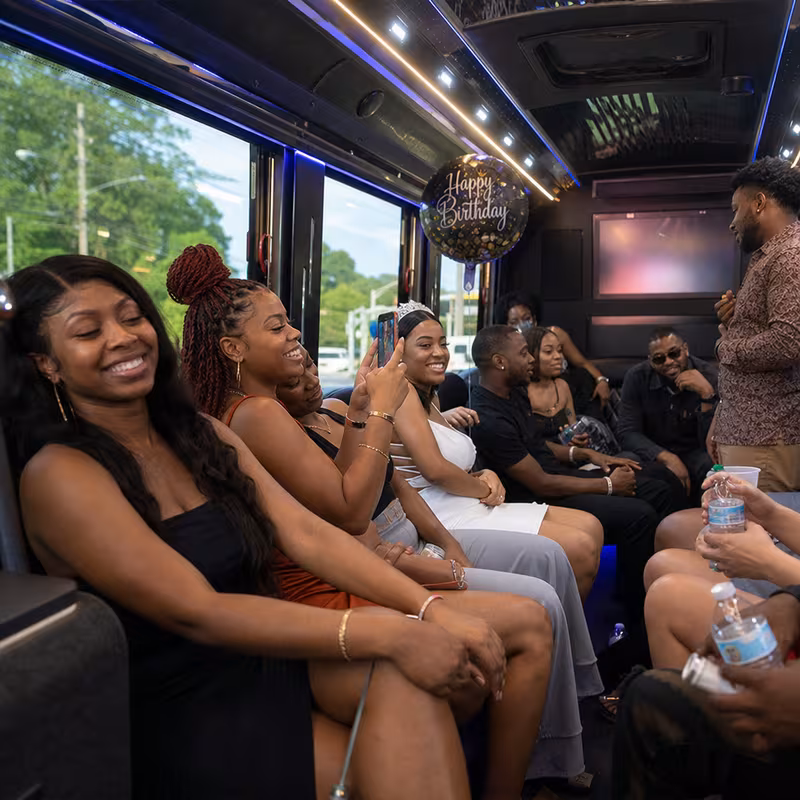 Black Mercedes Sprinter van staged for an New Orleans Birthday Transportation group