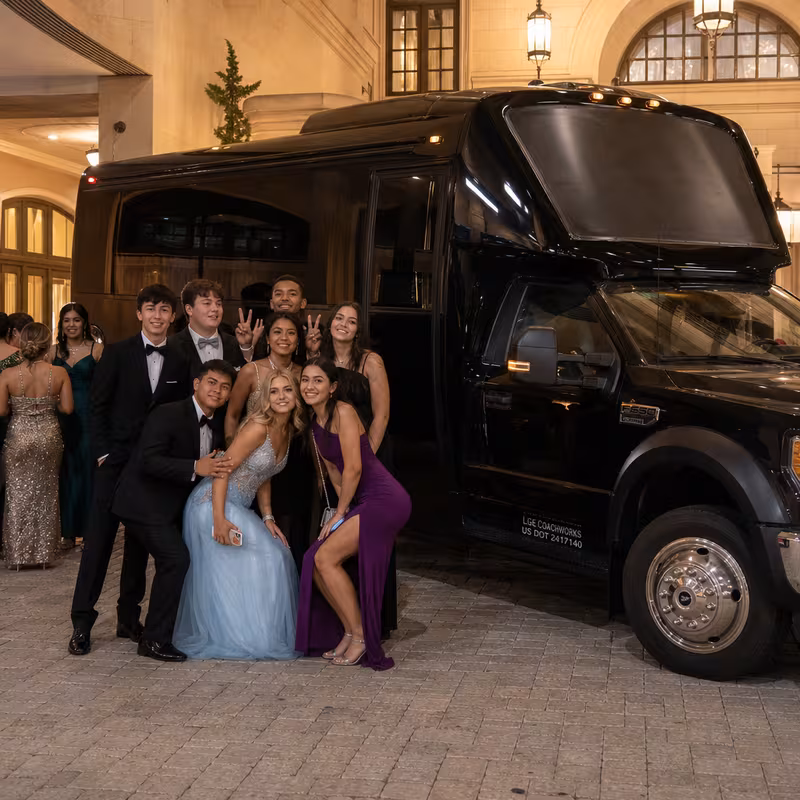 Party bus interior with wraparound leather seating and LED lighting in New Orleans