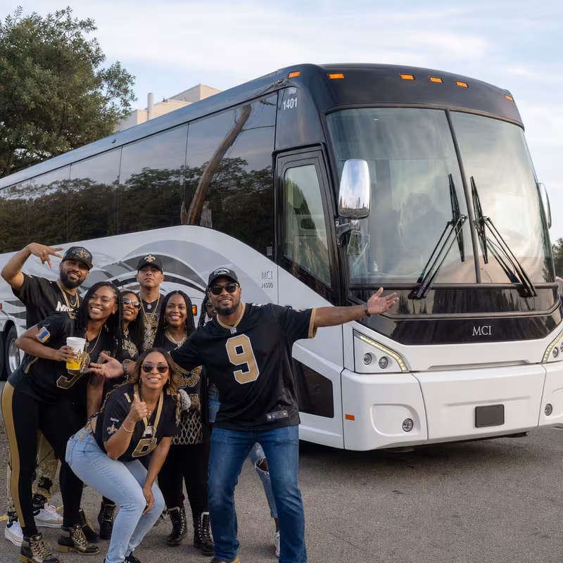 Passengers loading luggage while boarding an New Orleans group shuttle
